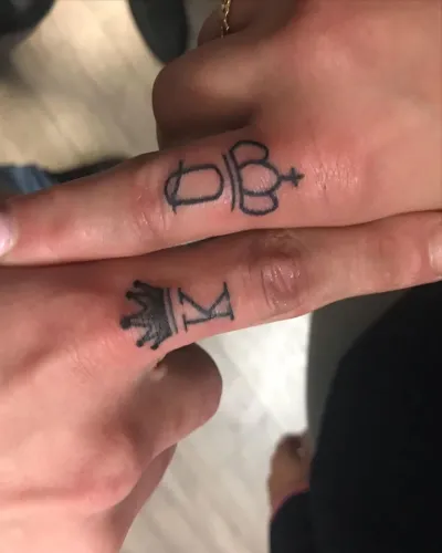 A Ring Of Royalty Couples Tattoo