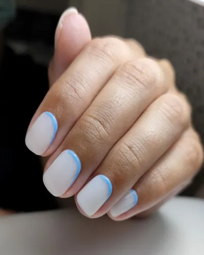 Baby Blue Reverse French Tips Nails