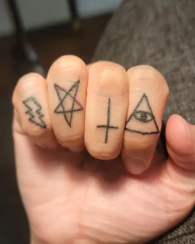 Black Ink Finger tattoos