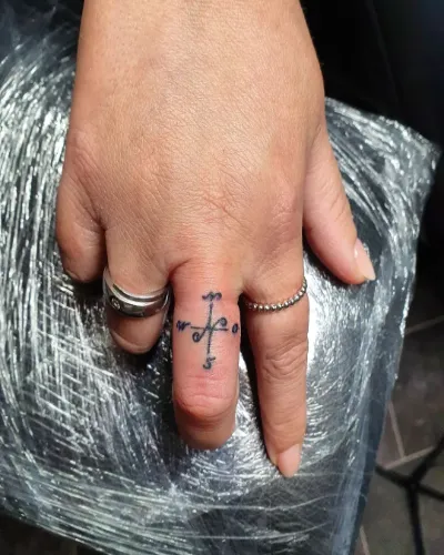 Cardinal Direction Finger Tattoo