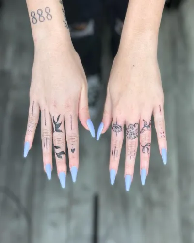 Black Finger Tattoo Designs
