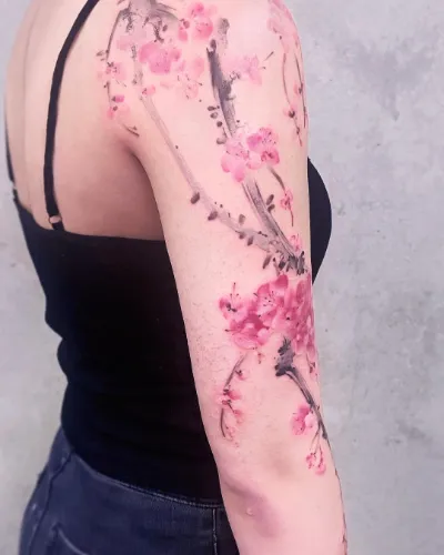 Classy Female Half Sleeve Tattoo Idea