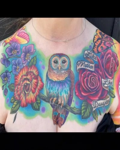 Colorful Owl Tattoo On Chest