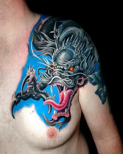Dragon Shoulder And Chest Tattoo
