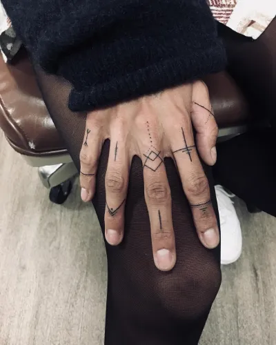 Geometric Patterns Finger Tattoos