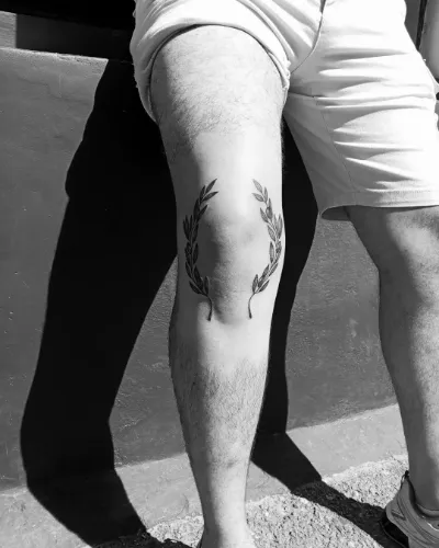 Greek God Tattoo For Knee