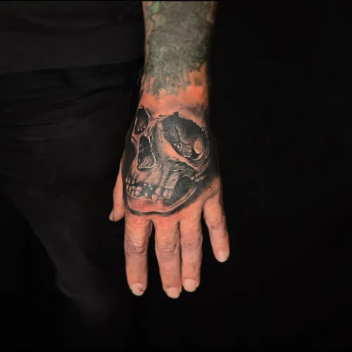 Killer Skull Hand Tattoo