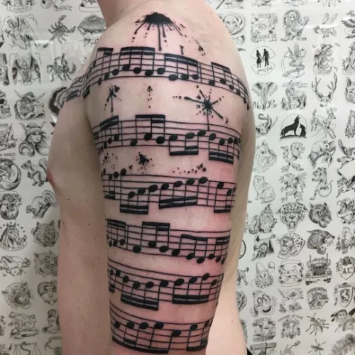 Music Notes Classy Half Sleeve Tattoo Women