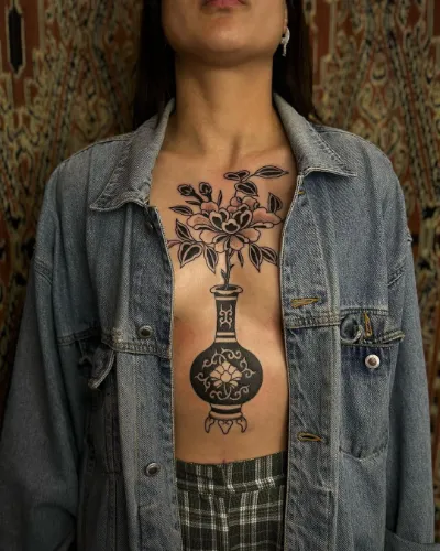  Flower Sternum Tattoo