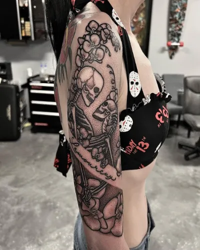 Skulls in Love Half Sleeve Tattoo