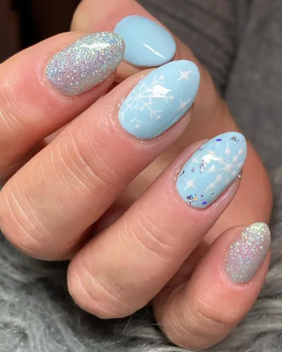 Snowflakes Baby Blue Nails Design