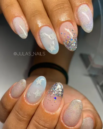 Starry Glittery Baby Blue Nail Design
