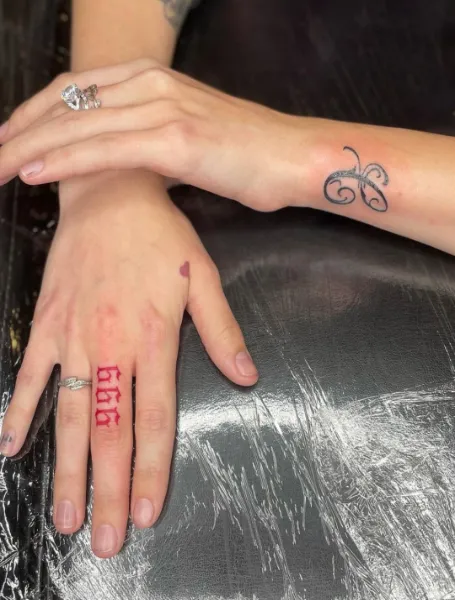 999 Finger Tattoo For Women