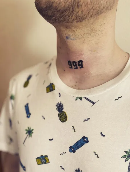 999 Front Neck Tattoo