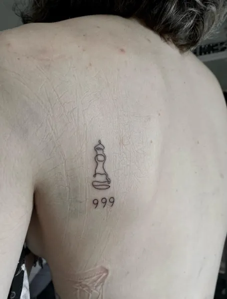 999 Shoulder Tattoo
