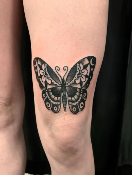 Butterfly Above The Knee Tattoo