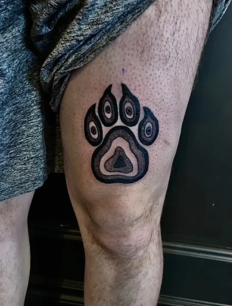 Animal Paw Print Above The Knees Tattoo