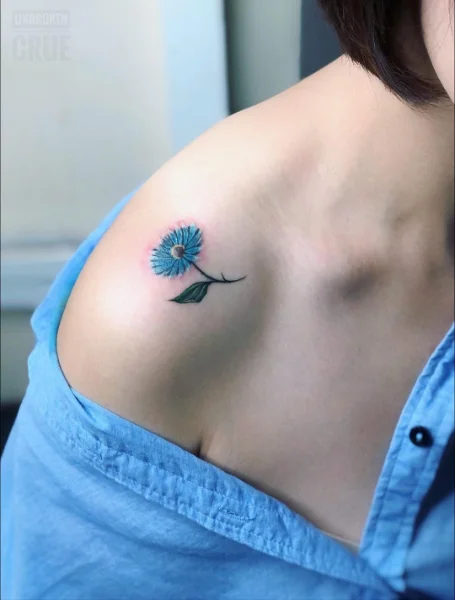 Daisy Shoulder Tattoo Idea For Women