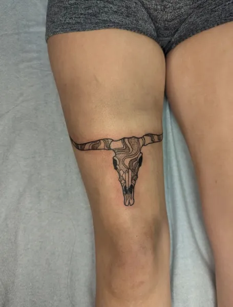 Cow Mask Tattoo Above The Knee