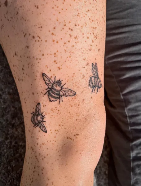 Bees Tattoo Above The Knee For Women