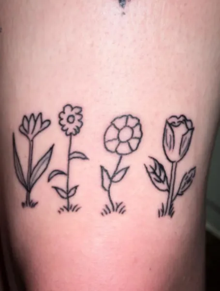 floral above the knee tattoo